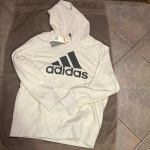 White colored Adidas Hoodie.